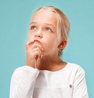 young girl who appears to be deep in thought